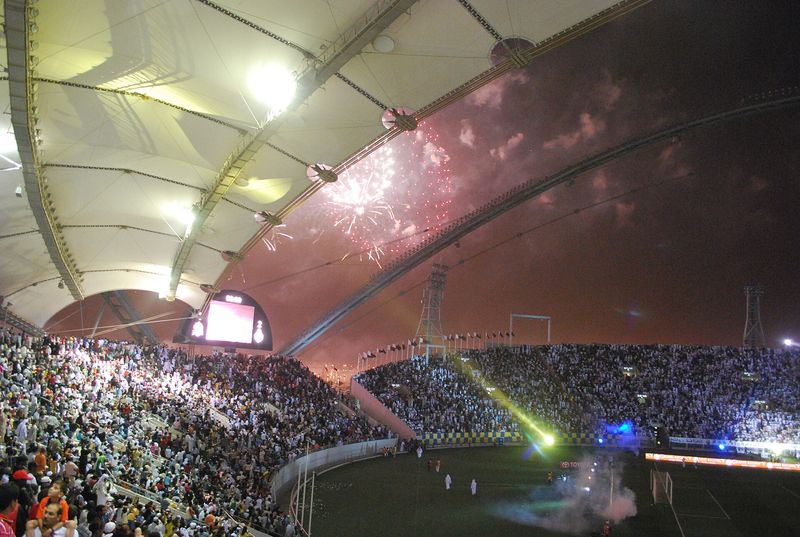 Floodlit Khalifa International Stadium during the 2009 Emir Cup final, fireworks above the roof, years before its 2017 redevelopment
